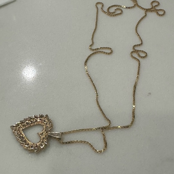 This is a yellow gold open heart diamond pendant necklace on a gold chain - Picture 8 of 8